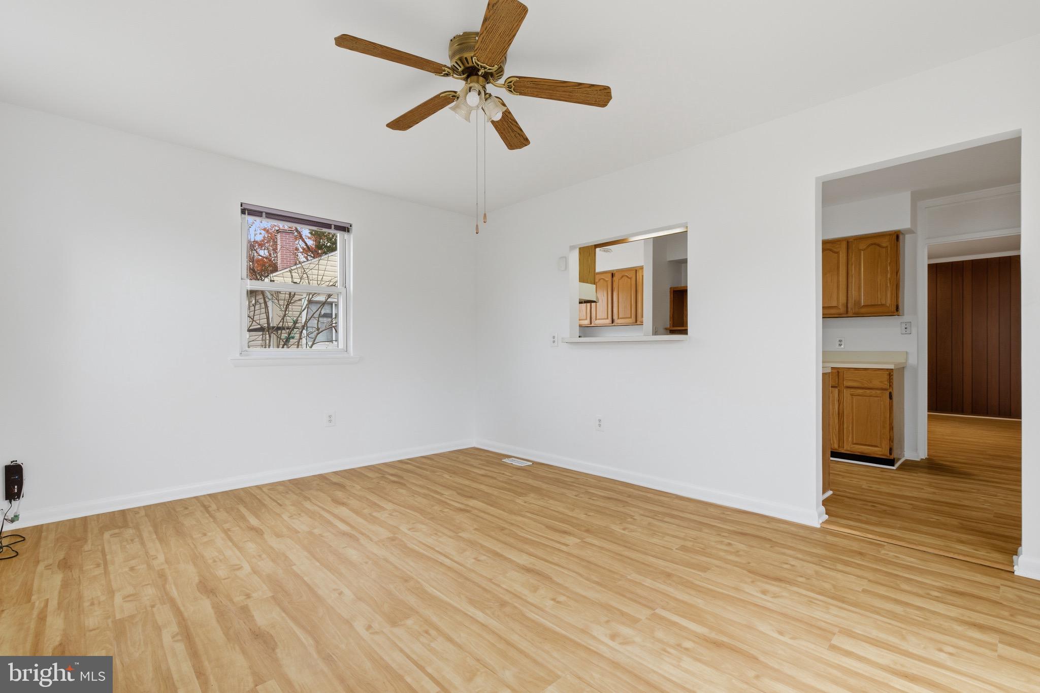 1004 Marton Street Laurel, MD 20707 - Photo 18 of 24 a view of empty room with wooden floor
