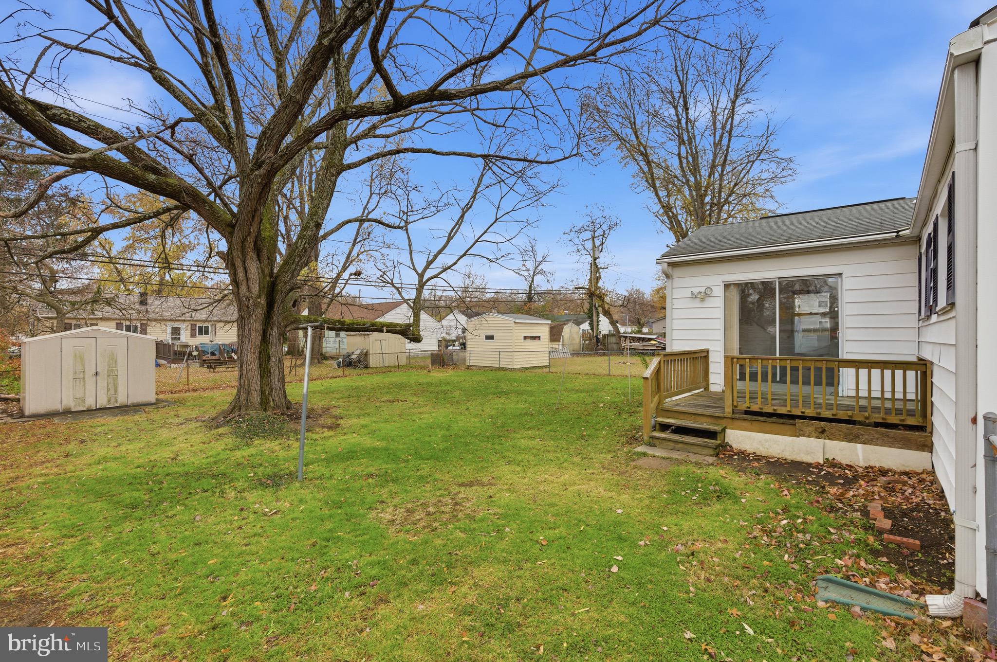 1004 Marton Street Laurel, MD 20707 - Photo 24 of 24 a view of a house with backyard and a tree
