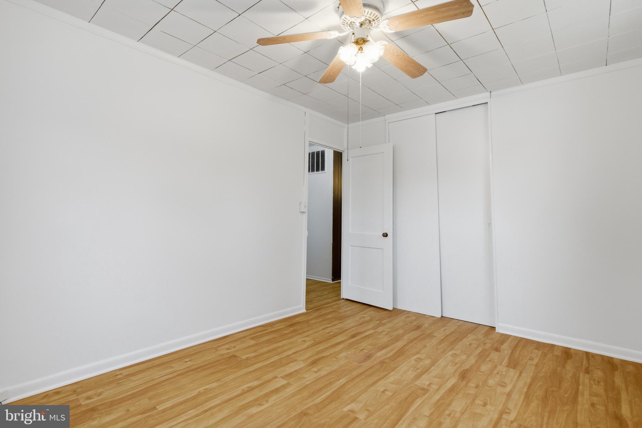 1004 Marton Street Laurel, MD 20707 - Photo 8 of 24 wooden floor in an empty room