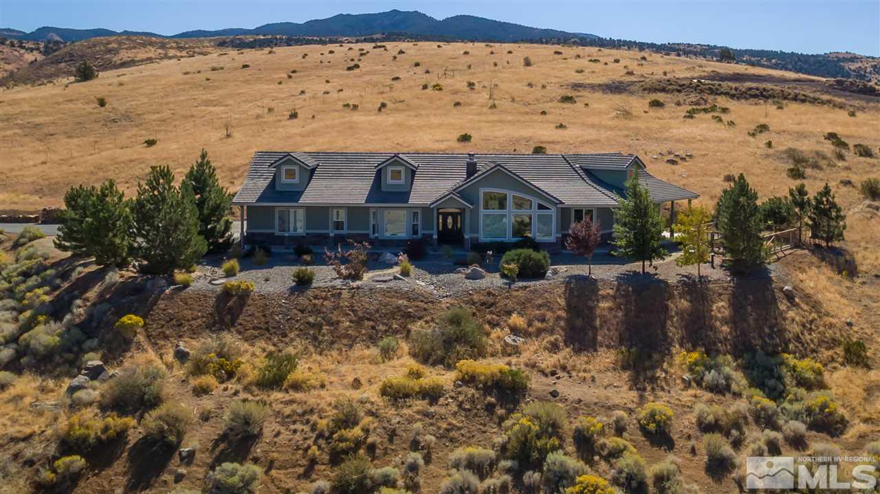 2730 Majestic View Court Reno, NV 89521 - Photo 1 of 1 a front view of a house with a yard