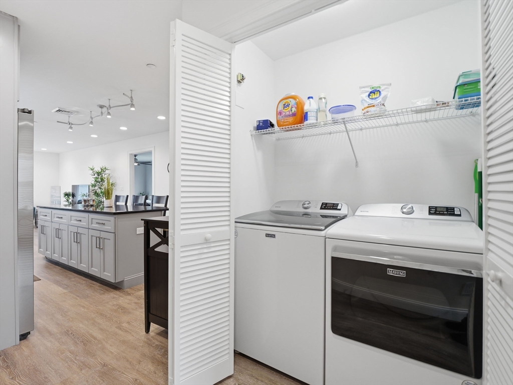 149 Pleasant Street, Unit 2 Marblehead, MA 01945 - Photo 15 of 41 a utility room with washer and dryer