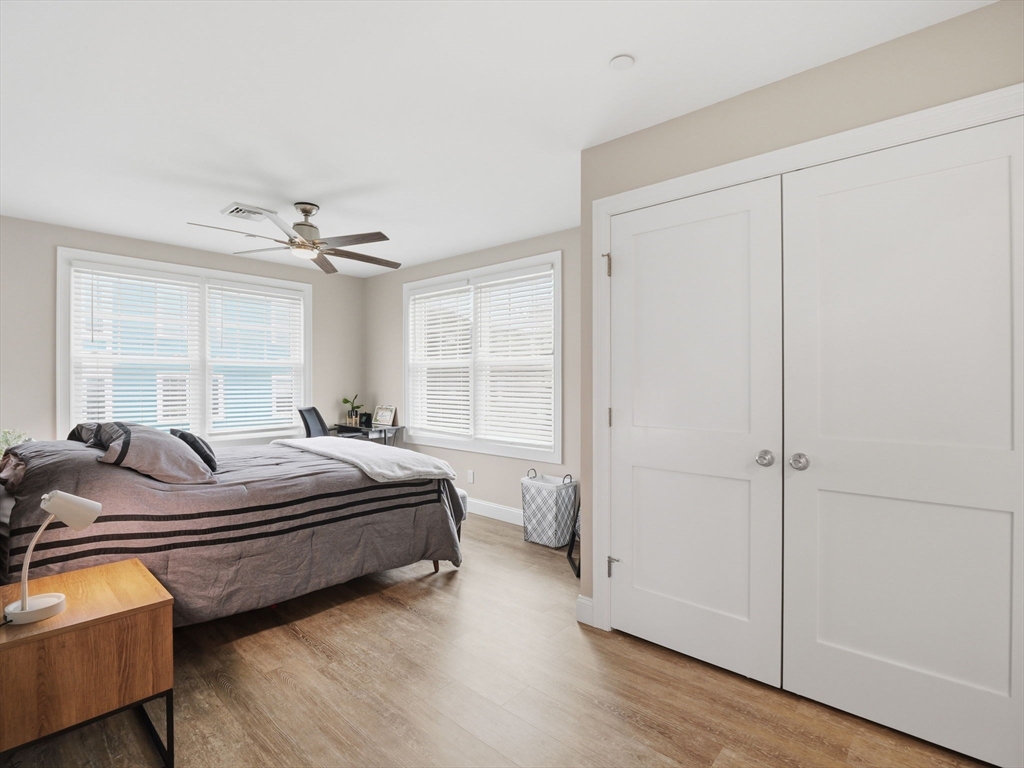 149 Pleasant Street, Unit 2 Marblehead, MA 01945 - Photo 26 of 41 a bedroom with bed and window