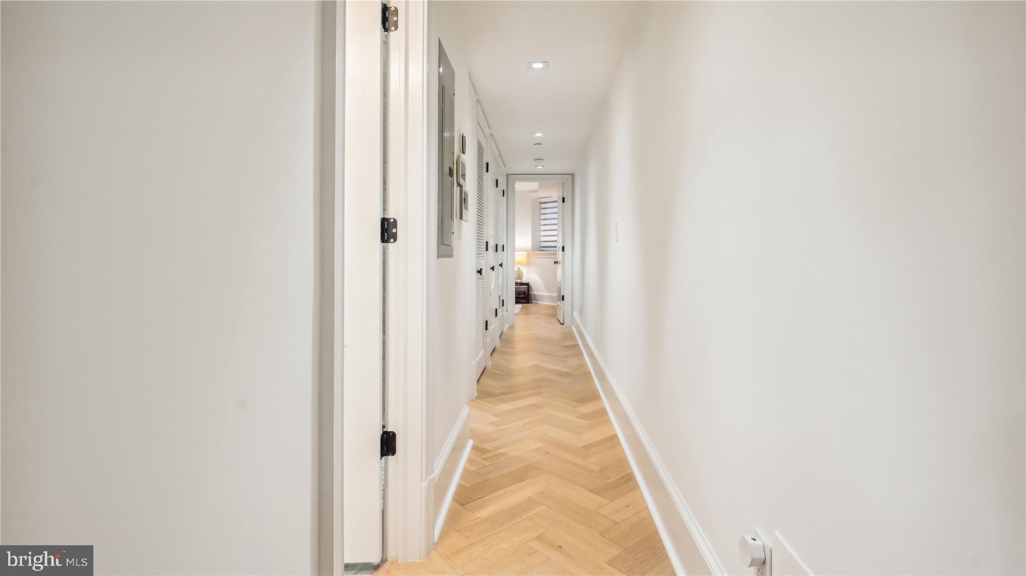 1832 16th Street Northwest, Unit 1 Washington, DC 20009 - Photo 12 of 25 a view of a hallway with a white walls