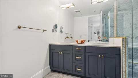 a spacious bathroom with a shower