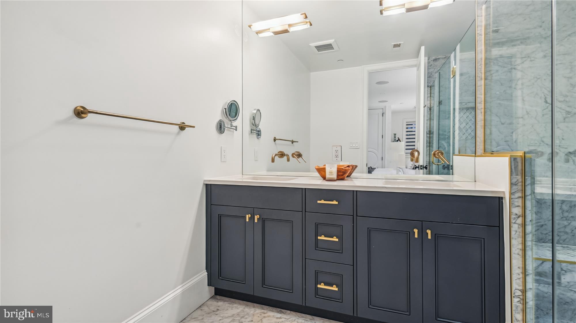 1832 16th Street Northwest, Unit 1 Washington, DC 20009 - Photo 17 of 25 a bathroom with a sink and a mirror