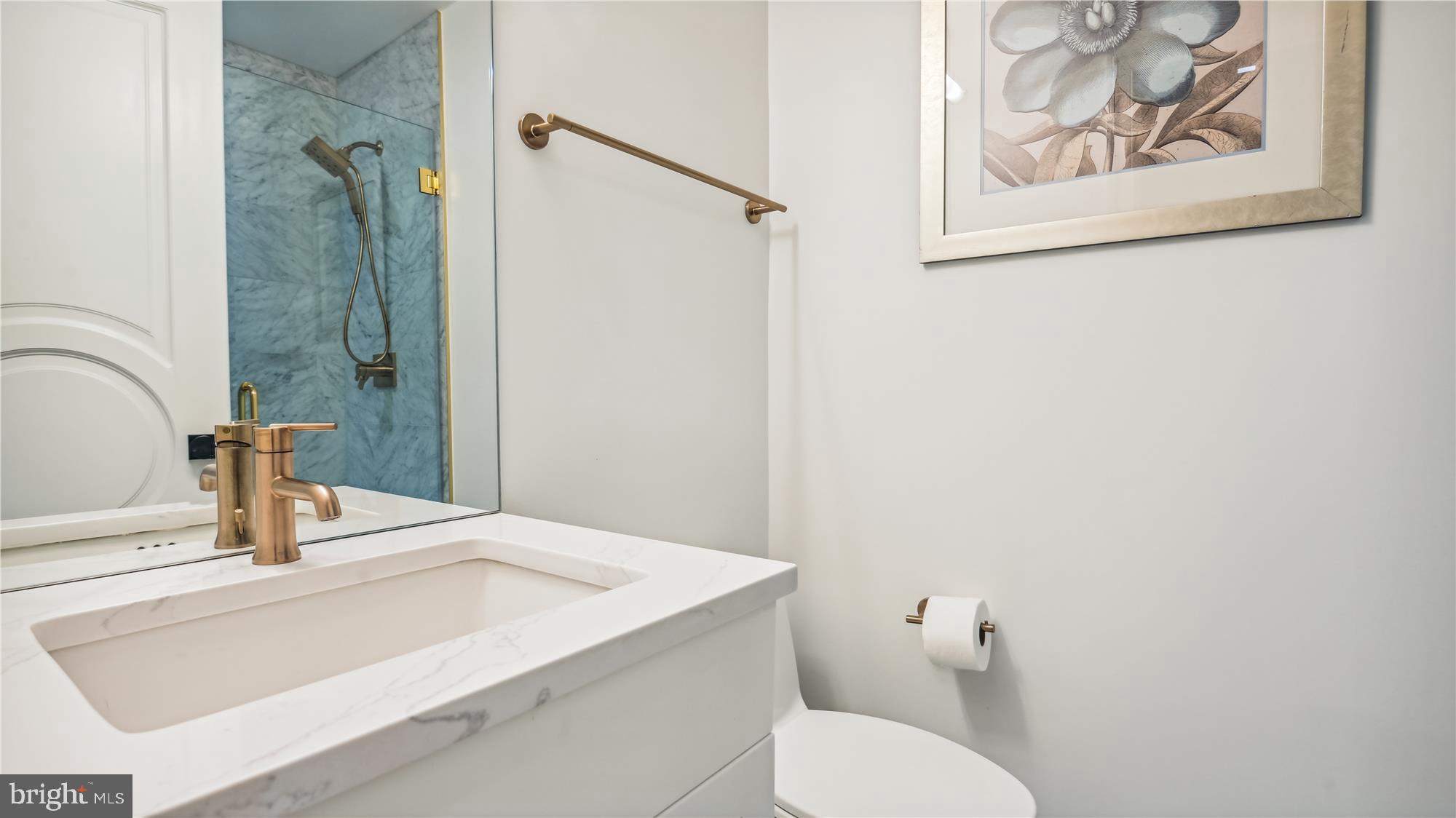 1832 16th Street Northwest, Unit 1 Washington, DC 20009 - Photo 22 of 25 a bathroom with a sink and toilet