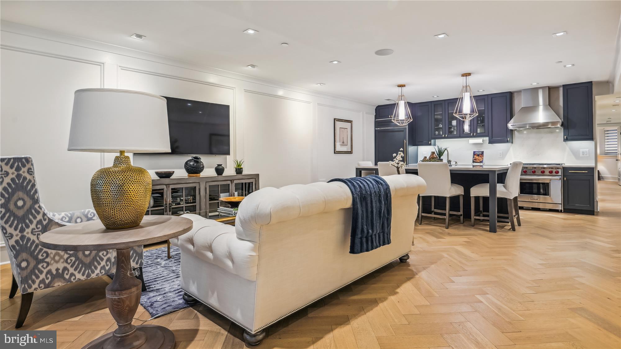 1832 16th Street Northwest, Unit 1 Washington, DC 20009 - Photo 4 of 25 a living room with lots of furniture and kitchen view