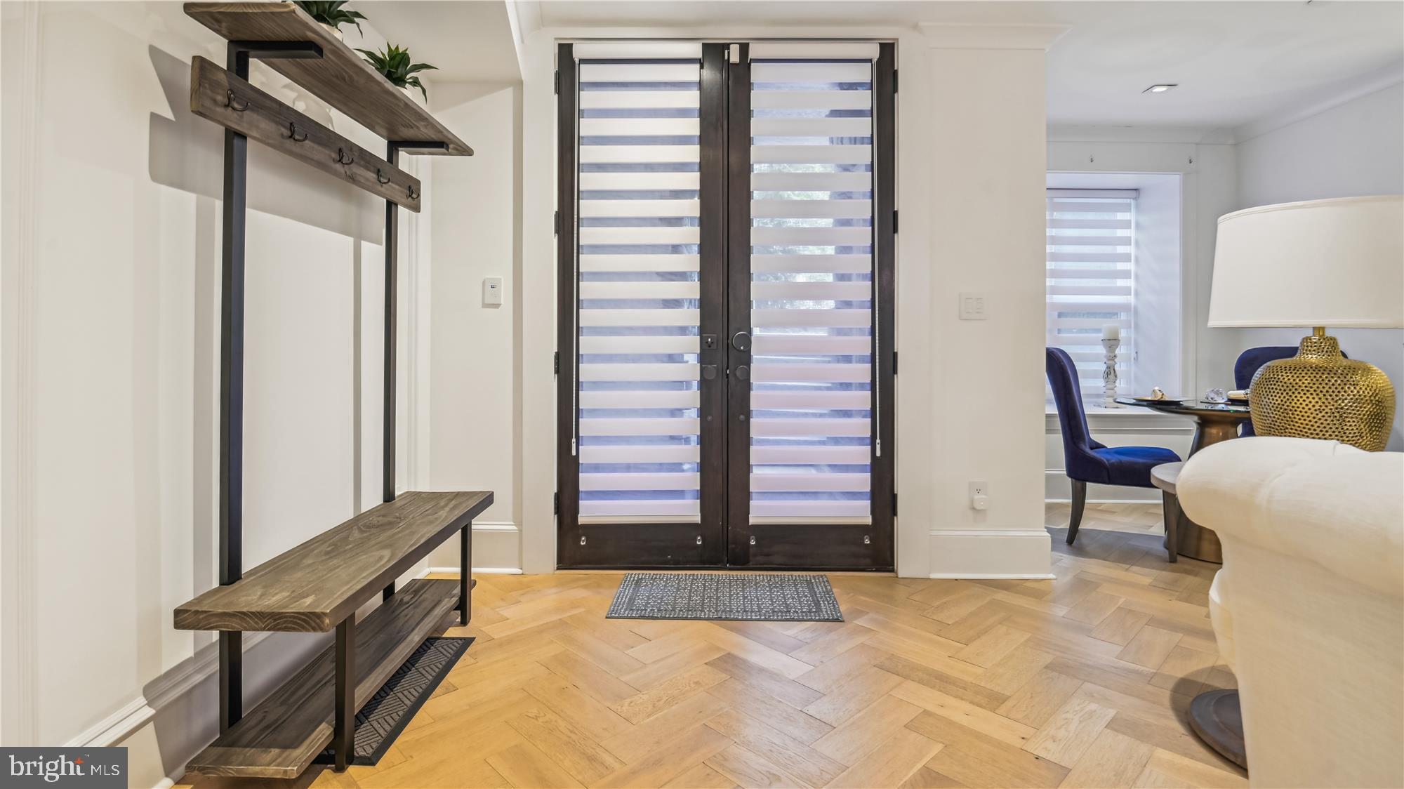 1832 16th Street Northwest, Unit 1 Washington, DC 20009 - Photo 5 of 25 a view of a livingroom with furniture and a window