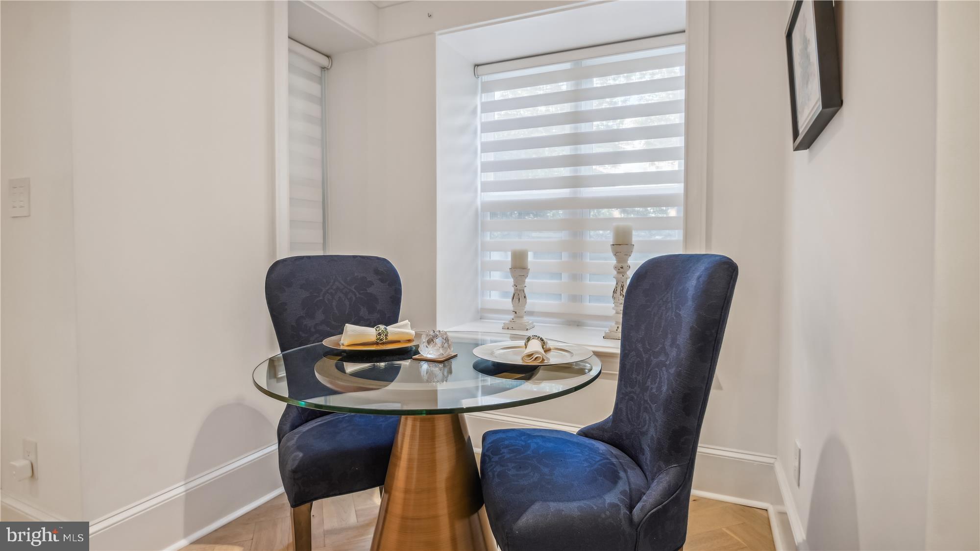 1832 16th Street Northwest, Unit 1 Washington, DC 20009 - Photo 6 of 25 a view of a workspace with furniture and a window
