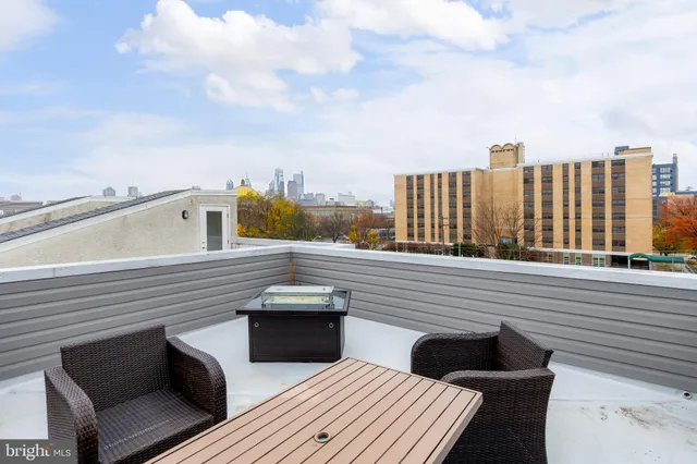 a view of a balcony with city view