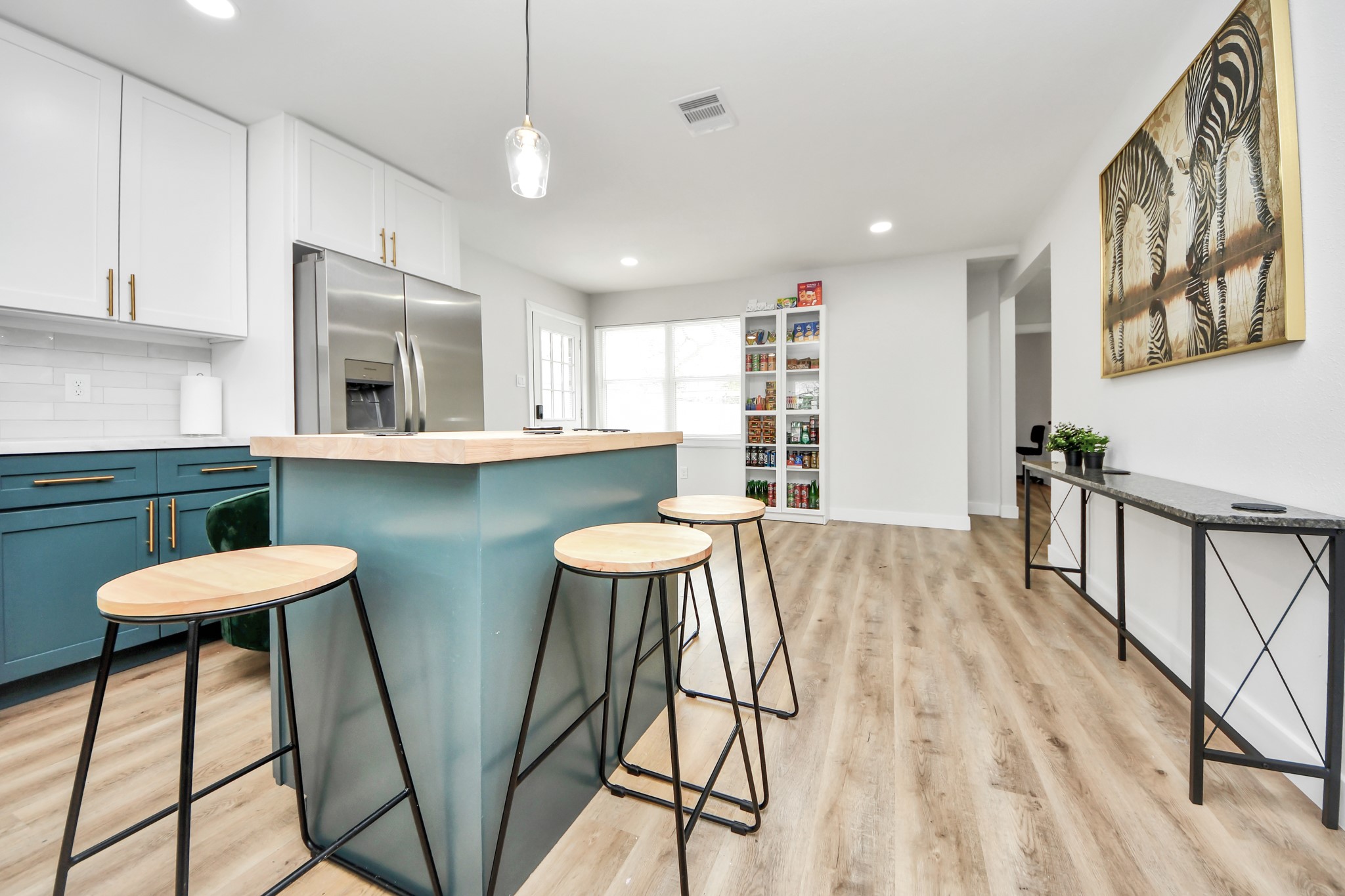 5115 Clay Street Houston, TX 77023 - Photo 12 of 43 a view of a dining room with furniture