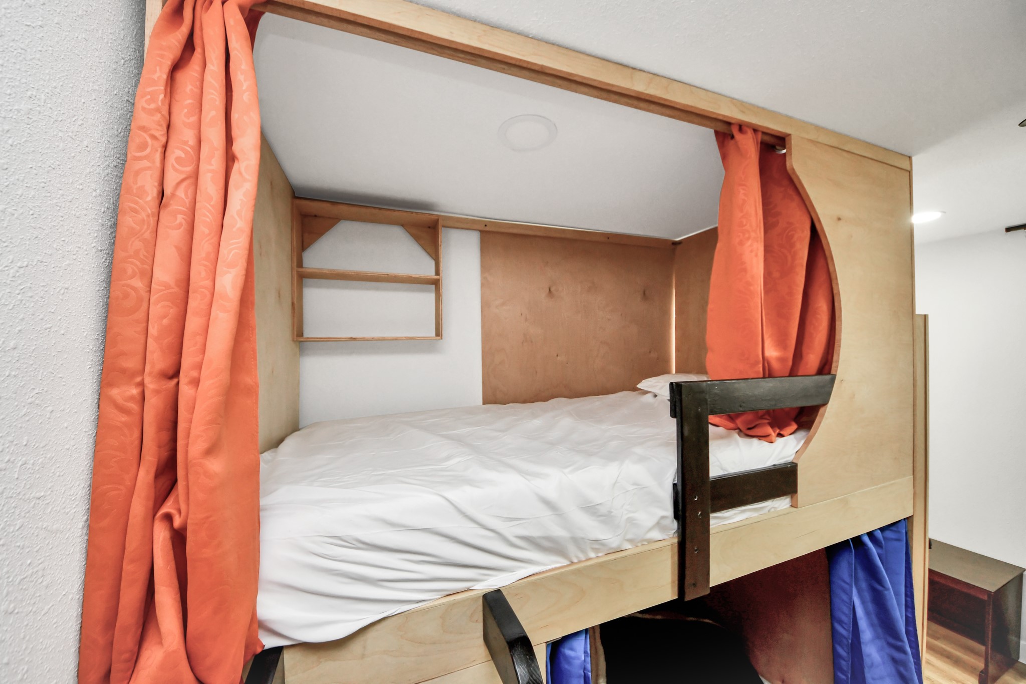 5115 Clay Street Houston, TX 77023 - Photo 21 of 43 a view of a bedroom with wooden floor and windows