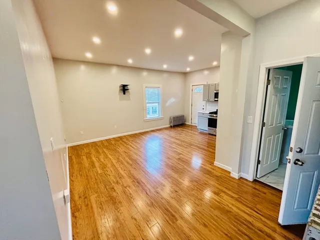 a view of entryway with wooden floor