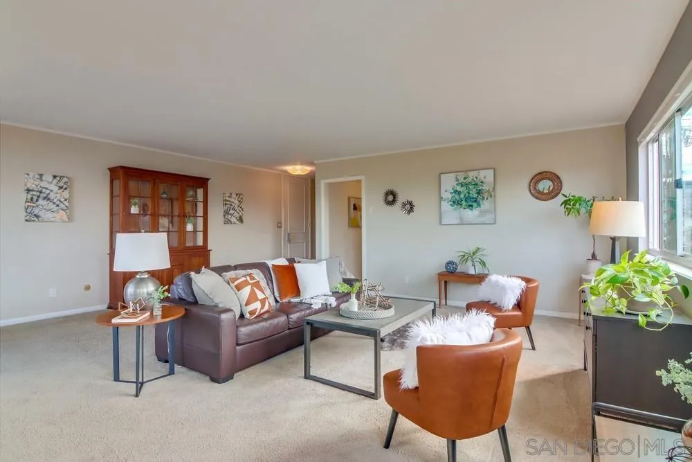 2701 2nd Avenue, Unit 201 San Diego, CA 92103 - Photo 11 of 39 a living room with furniture and a potted plant