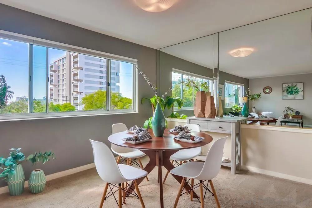 2701 2nd Avenue, Unit 201 San Diego, CA 92103 - Photo 13 of 39 a view of a dining room with furniture window and outside view