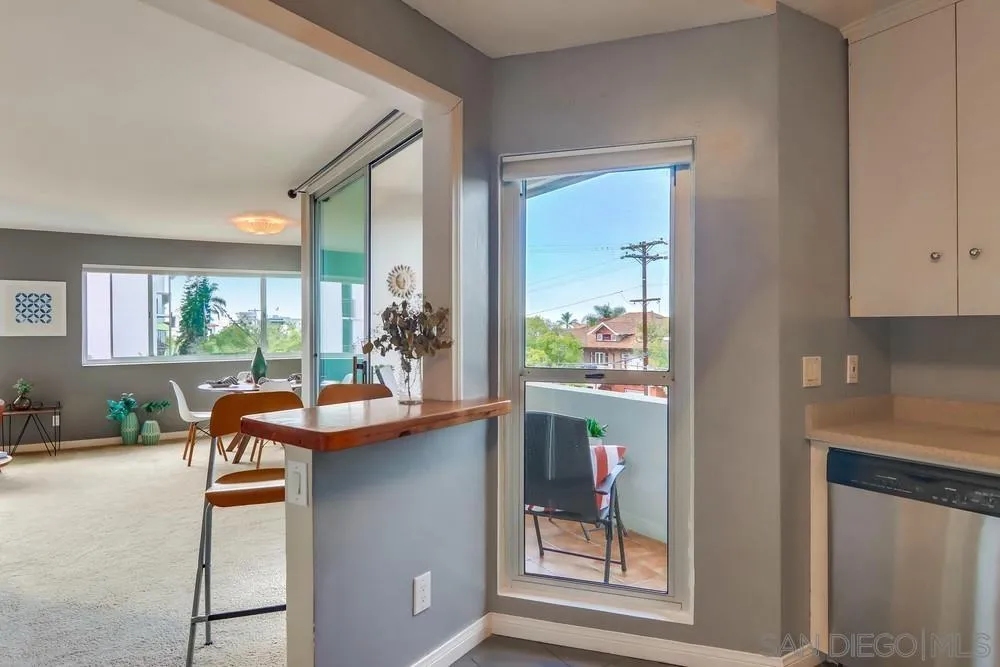 2701 2nd Avenue, Unit 201 San Diego, CA 92103 - Photo 23 of 39 a room with a table and chairs