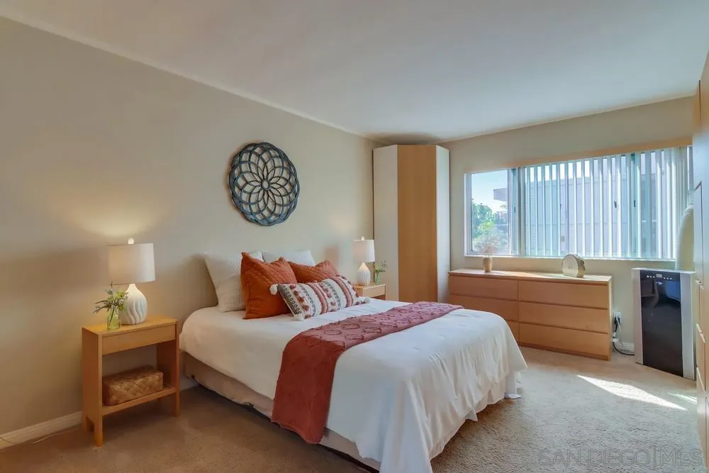 2701 2nd Avenue, Unit 201 San Diego, CA 92103 - Photo 28 of 39 a bedroom with a bed and a table