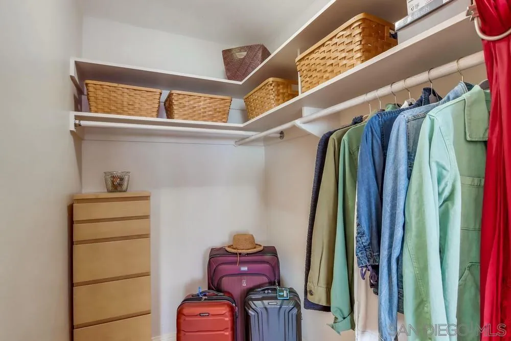 2701 2nd Avenue, Unit 201 San Diego, CA 92103 - Photo 35 of 39 a view of walk in closet with clothes and shoes