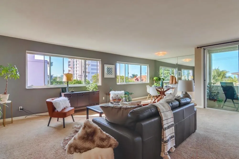 2701 2nd Avenue, Unit 201 San Diego, CA 92103 - Photo 6 of 39 a living room with furniture and a large window