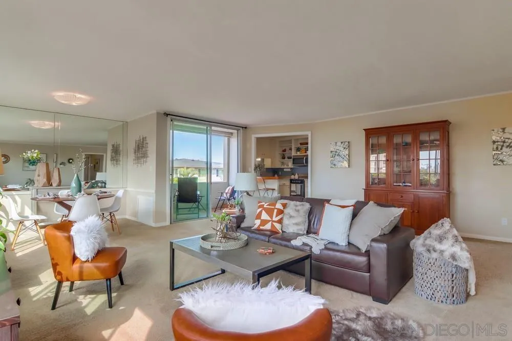2701 2nd Avenue, Unit 201 San Diego, CA 92103 - Photo 8 of 39 a living room with furniture and a wooden floor