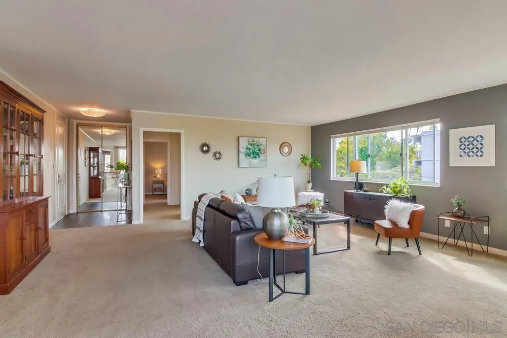 2701 2nd Avenue, Unit 201 San Diego, CA 92103 - Photo 9 of 39 a living room with furniture and a large window