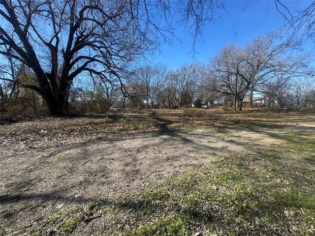 a view of a yard with an outdoor space