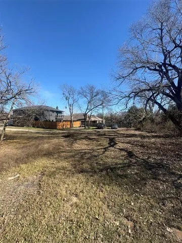 a view of backyard with green space