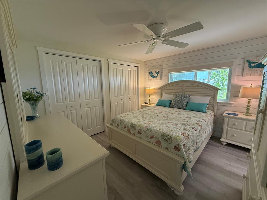 637 Los Altos, Unit 374 North Port, FL 34287 - Photo 13 of 26 a bedroom with a bed and a dresser