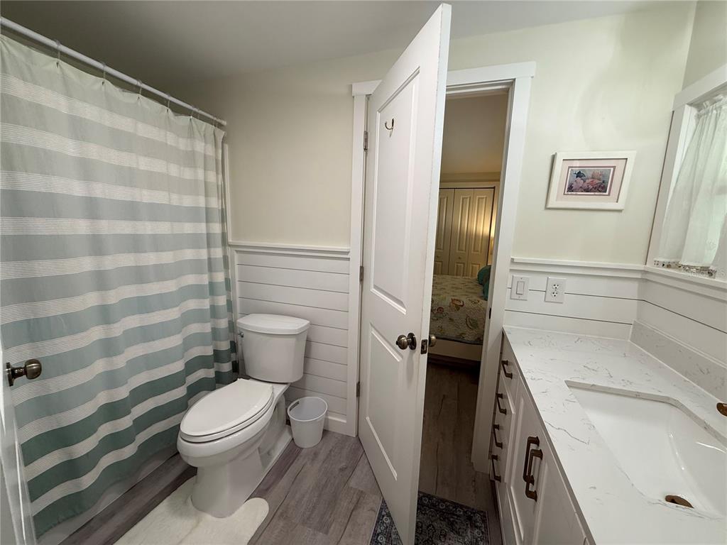 637 Los Altos, Unit 374 North Port, FL 34287 - Photo 17 of 26 a bathroom with a sink toilet and shower