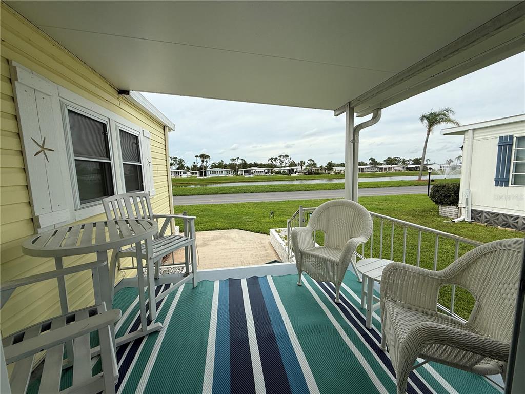 637 Los Altos, Unit 374 North Port, FL 34287 - Photo 20 of 26 a view of a patio with swimming pool