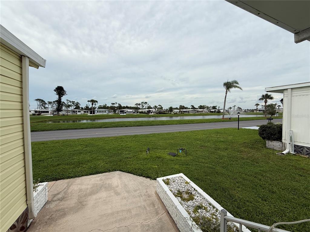 637 Los Altos, Unit 374 North Port, FL 34287 - Photo 22 of 26 a view of a golf course with a garden