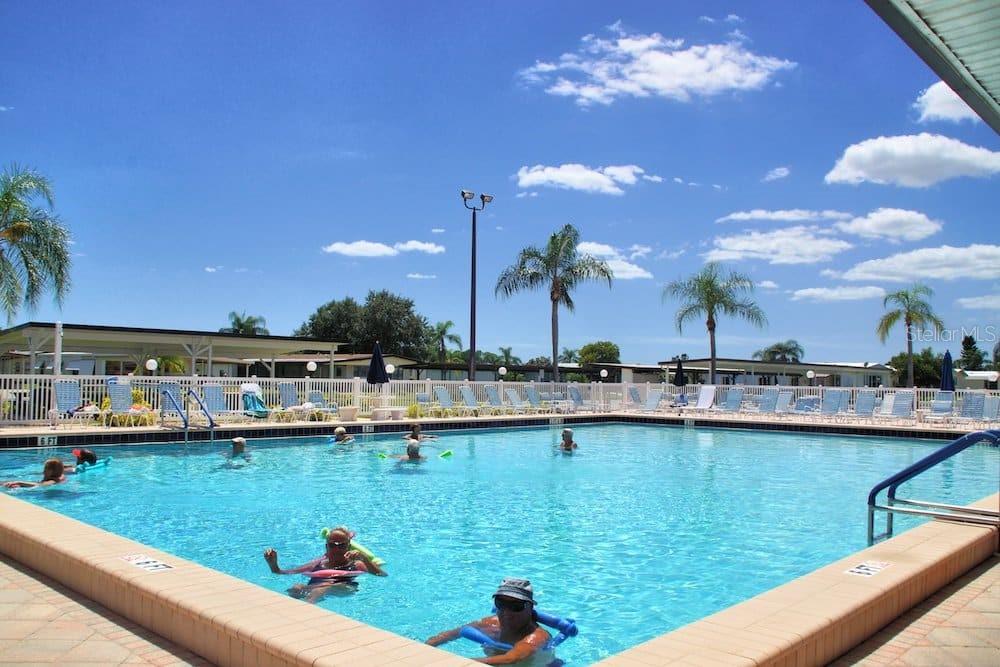637 Los Altos, Unit 374 North Port, FL 34287 - Photo 26 of 26 a view of a lake with chairs