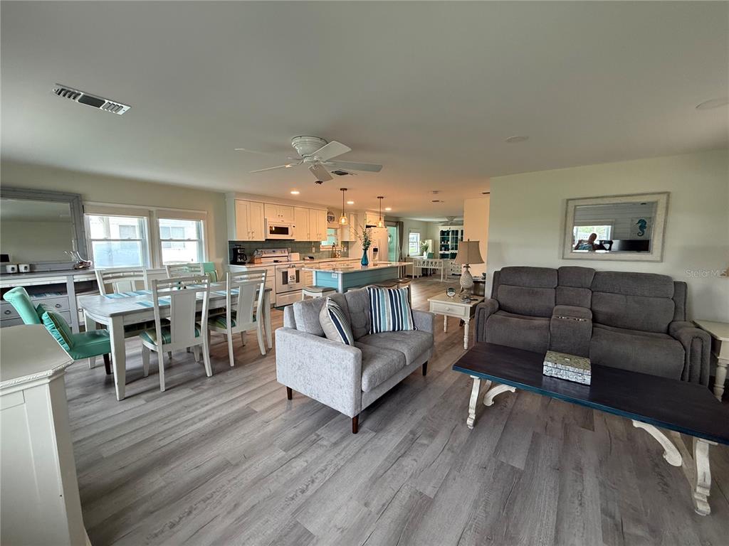 637 Los Altos, Unit 374 North Port, FL 34287 - Photo 8 of 26 a living room with furniture and a table