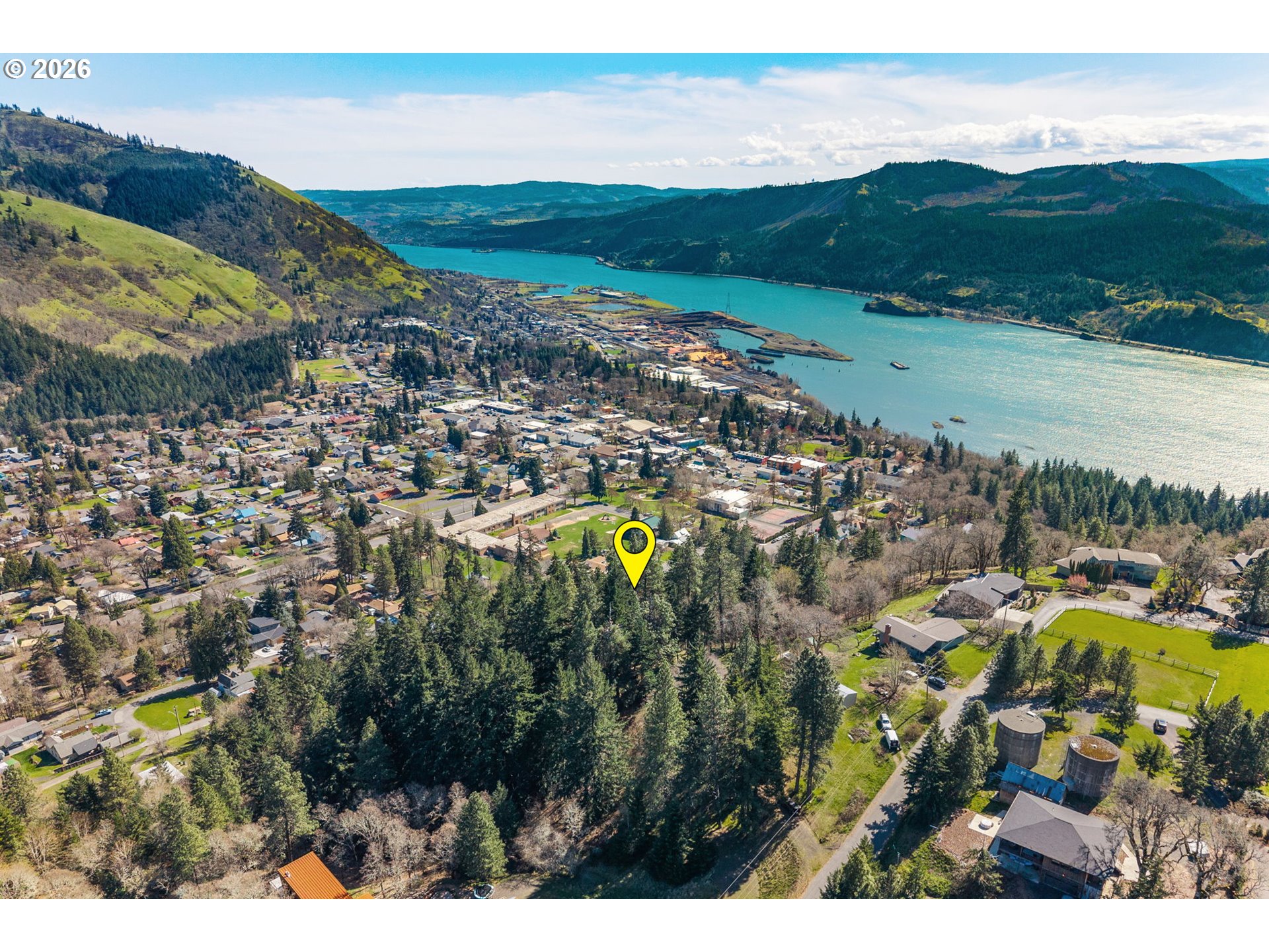 735 Northwest Strawberry Mountain Road White Salmon, WA 98672 - Photo 6 of 25 a view of a city with mountains in the background