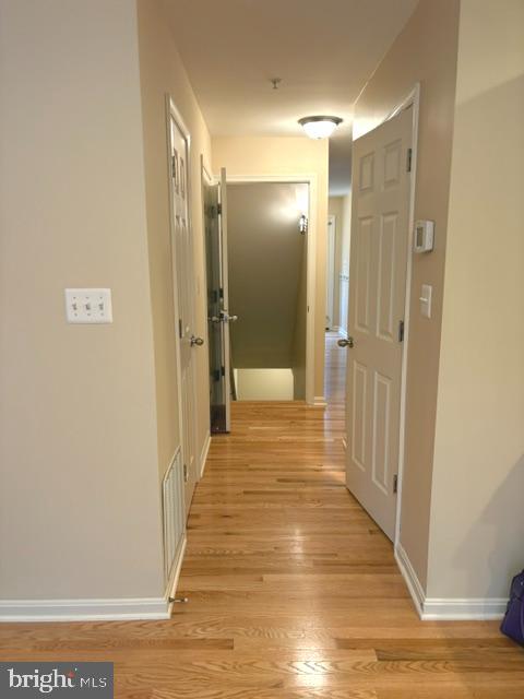 5870 Deer Ridge Lane Elkridge, MD 21075 - Photo 31 of 55 Main level hall w/powder room and coat closet