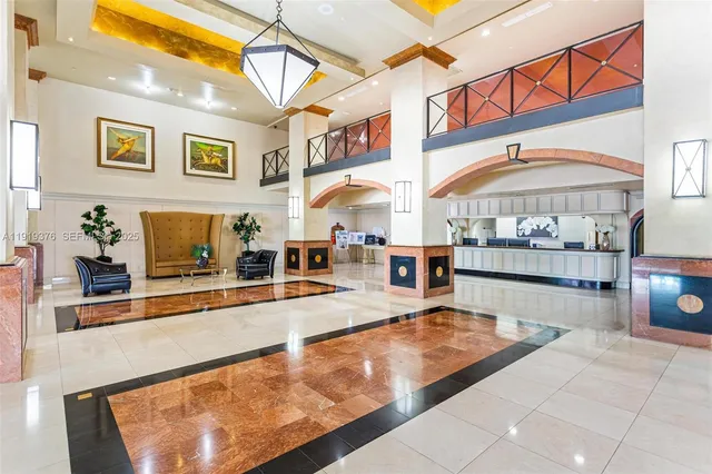 a swimming pool with outdoor seating