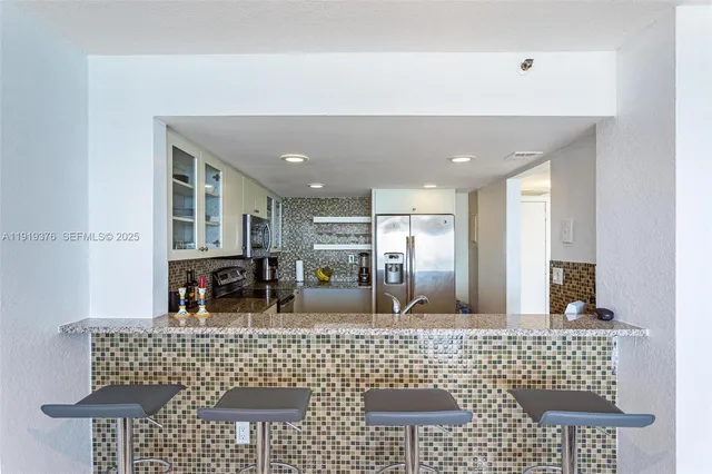 a view of living room filled with furniture