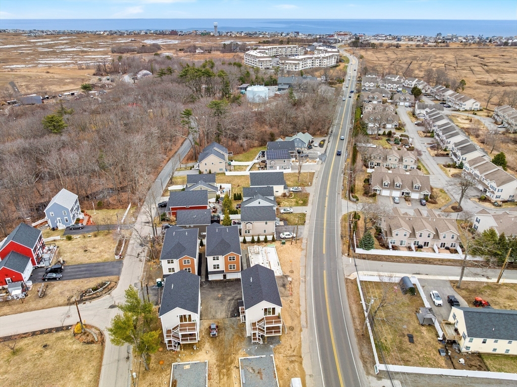 2 Old County Road, Unit 14 Salisbury, MA 01952 - Photo 29 of 33 an aerial view of residential building and parking space