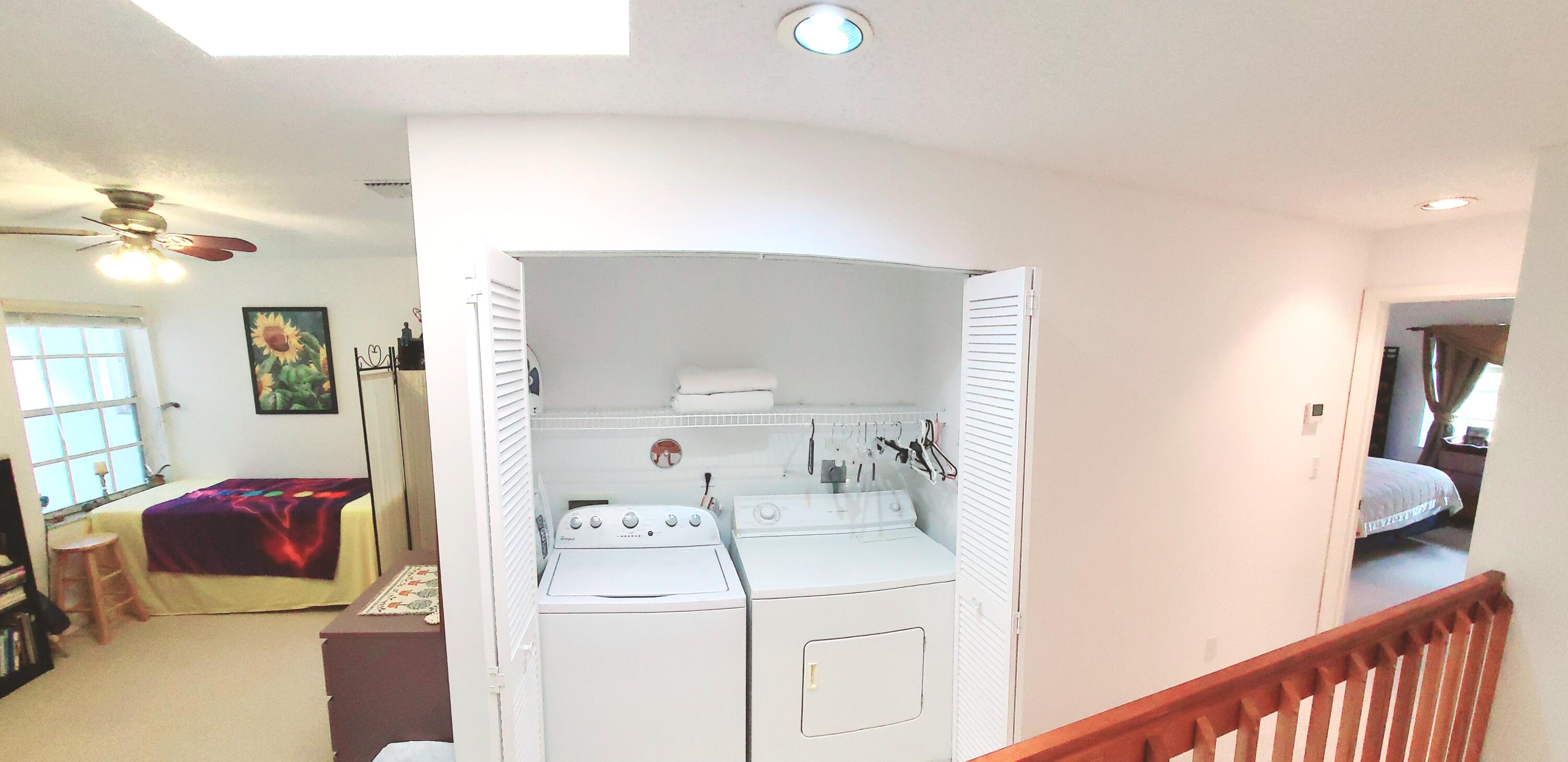 5121 Sabal Gardens Lane, Unit 2 Boca Raton, FL 33487 - Photo 19 of 25 a en suite bathroom with a sink a mirror and a shower