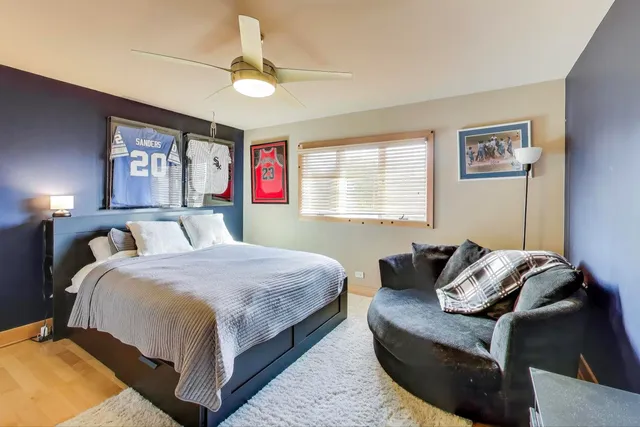 a bed room with a bed and a couch