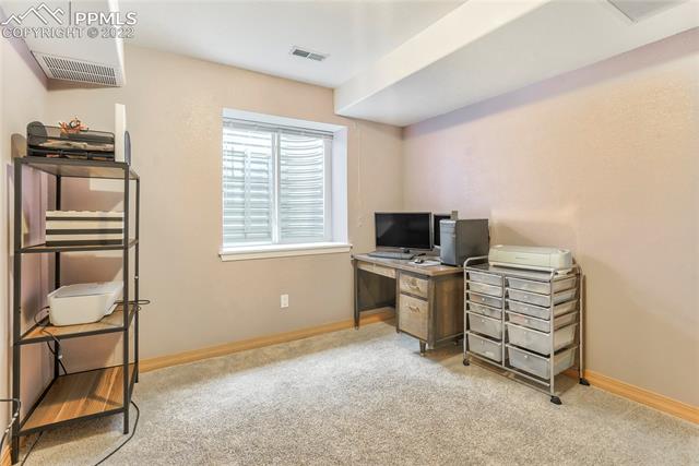 8820 Theriot Road Peyton, CO 80831 - Photo 44 of 50 Lower level 5th bedroom close to stairs and full bath