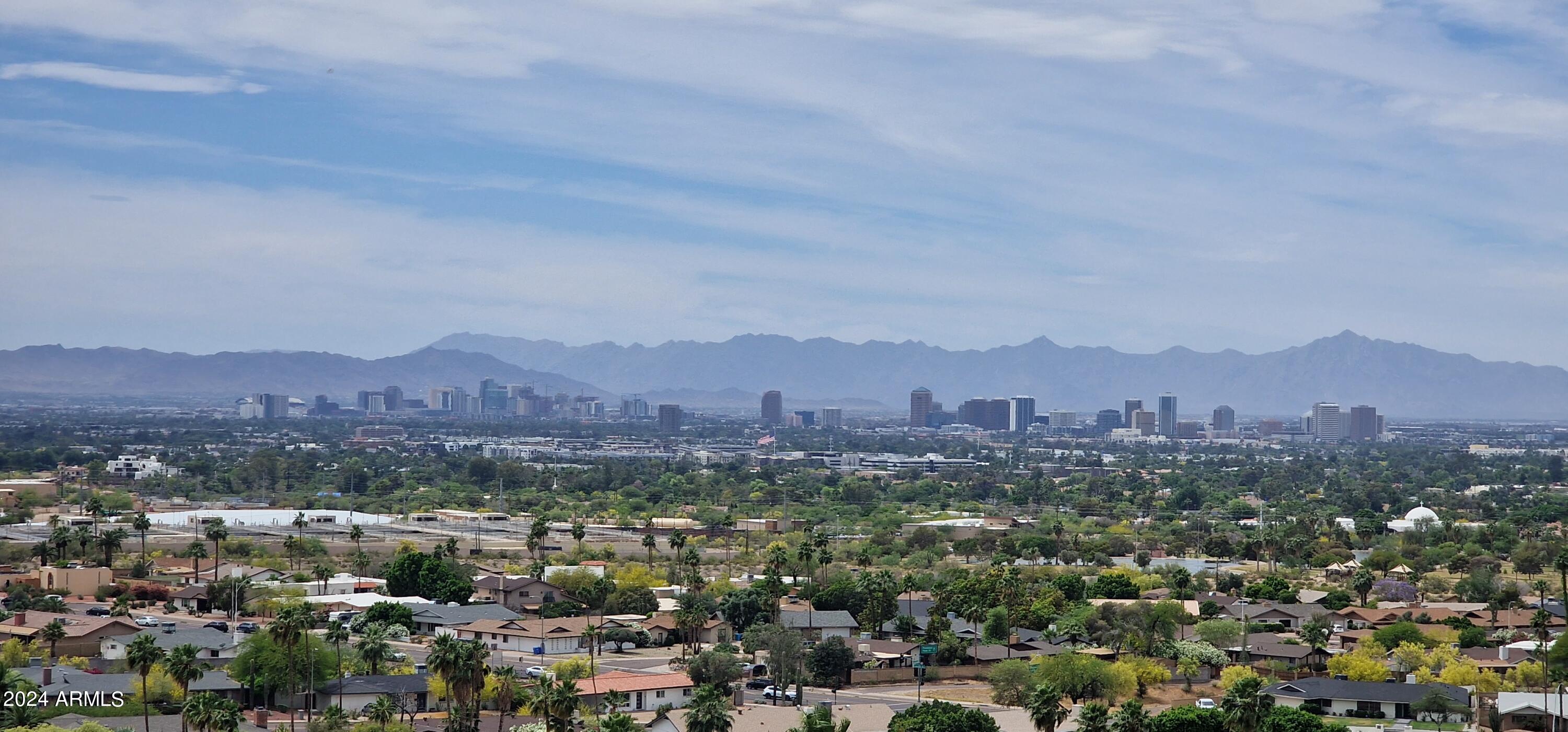 an aerial view of residential house and green space