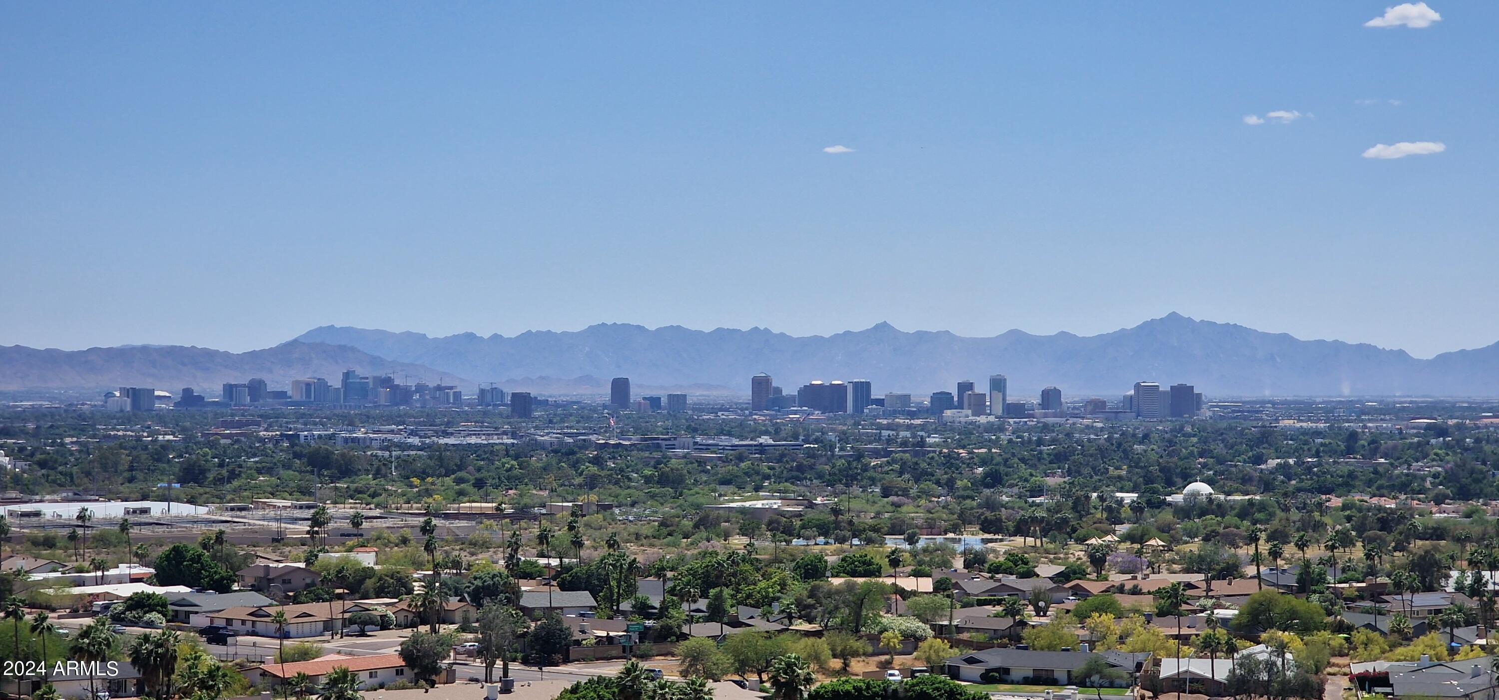 7035 North 23rd Place Phoenix, AZ 85016 - Photo 3 of 10 an aerial view of residential houses and city view
