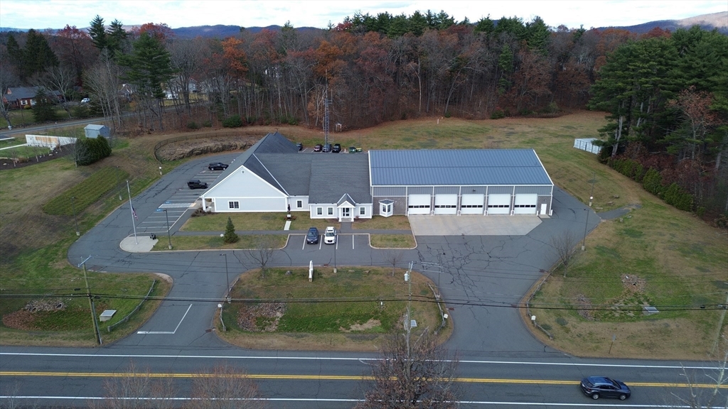Lot 8 East State Street Granby, MA 01033 - Photo 11 of 16 an aerial view of a house with garden