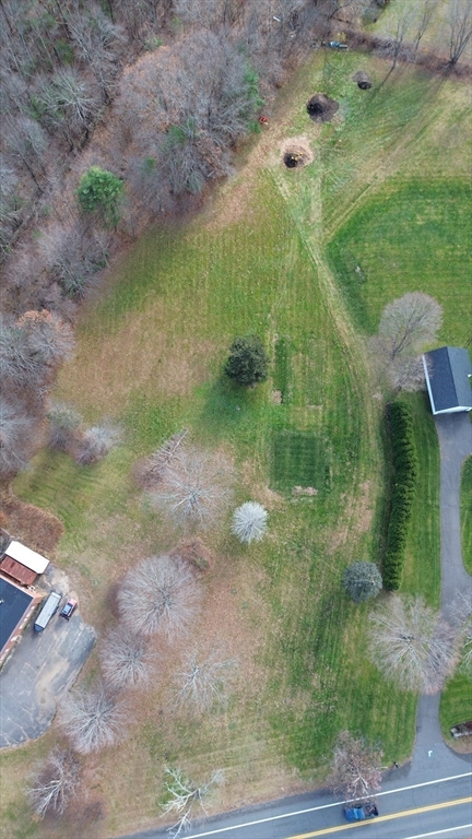 Lot 8 East State Street Granby, MA 01033 - Photo 6 of 16 a view of a green yard
