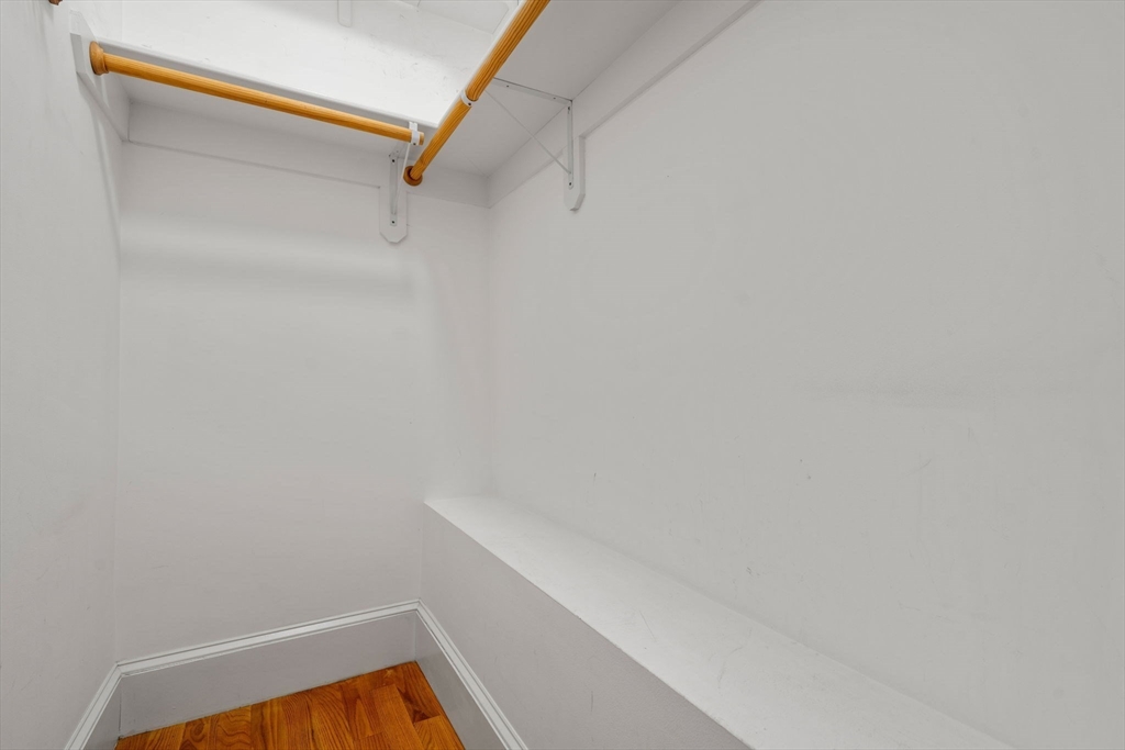 19 Pinckney Street, Unit 1 Somerville, MA 02145 - Photo 21 of 39 a view of small space with racks on the wall