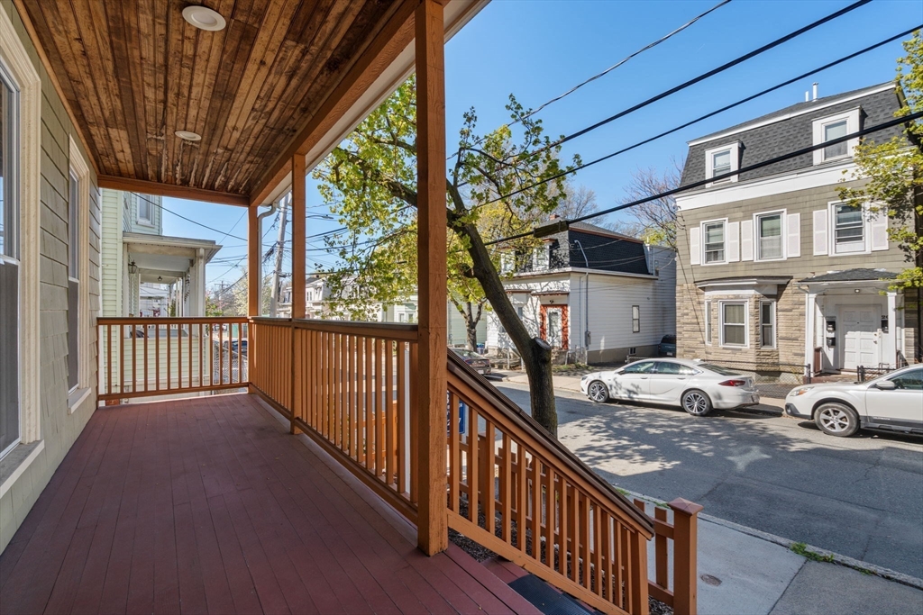 19 Pinckney Street, Unit 1 Somerville, MA 02145 - Photo 34 of 39 a view of a porch with furniture and garden