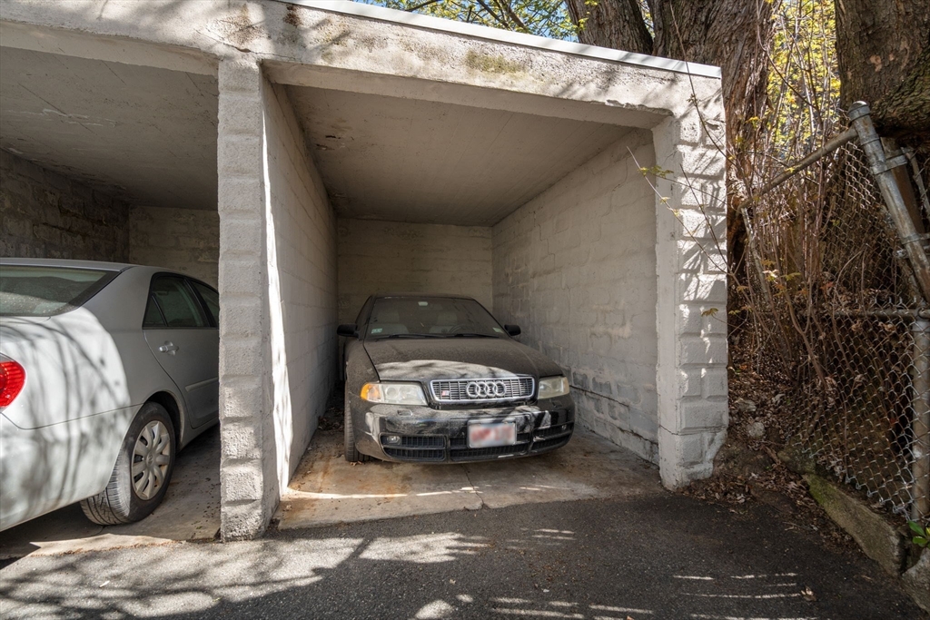 19 Pinckney Street, Unit 1 Somerville, MA 02145 - Photo 35 of 39 a car parked in front of a building