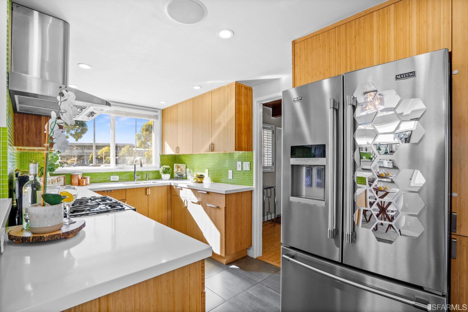 1854 Key Boulevard El Cerrito, CA 94530 - Photo 11 of 43 a kitchen with stainless steel appliances a refrigerator and a stove