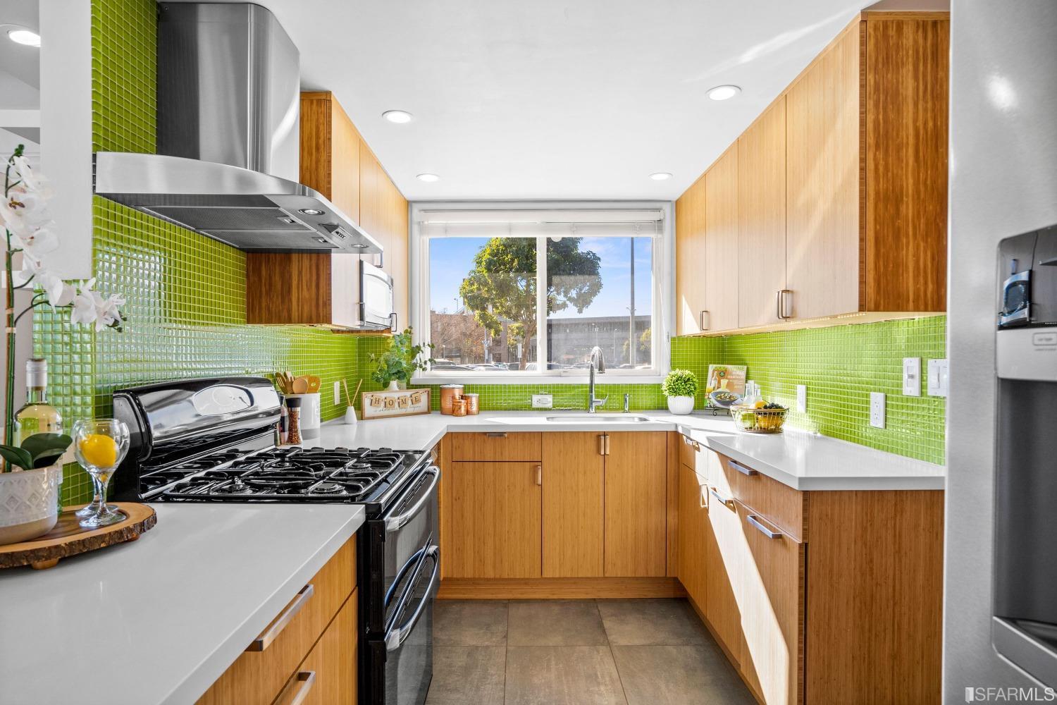 1854 Key Boulevard El Cerrito, CA 94530 - Photo 12 of 43 a kitchen with a sink a stove and window